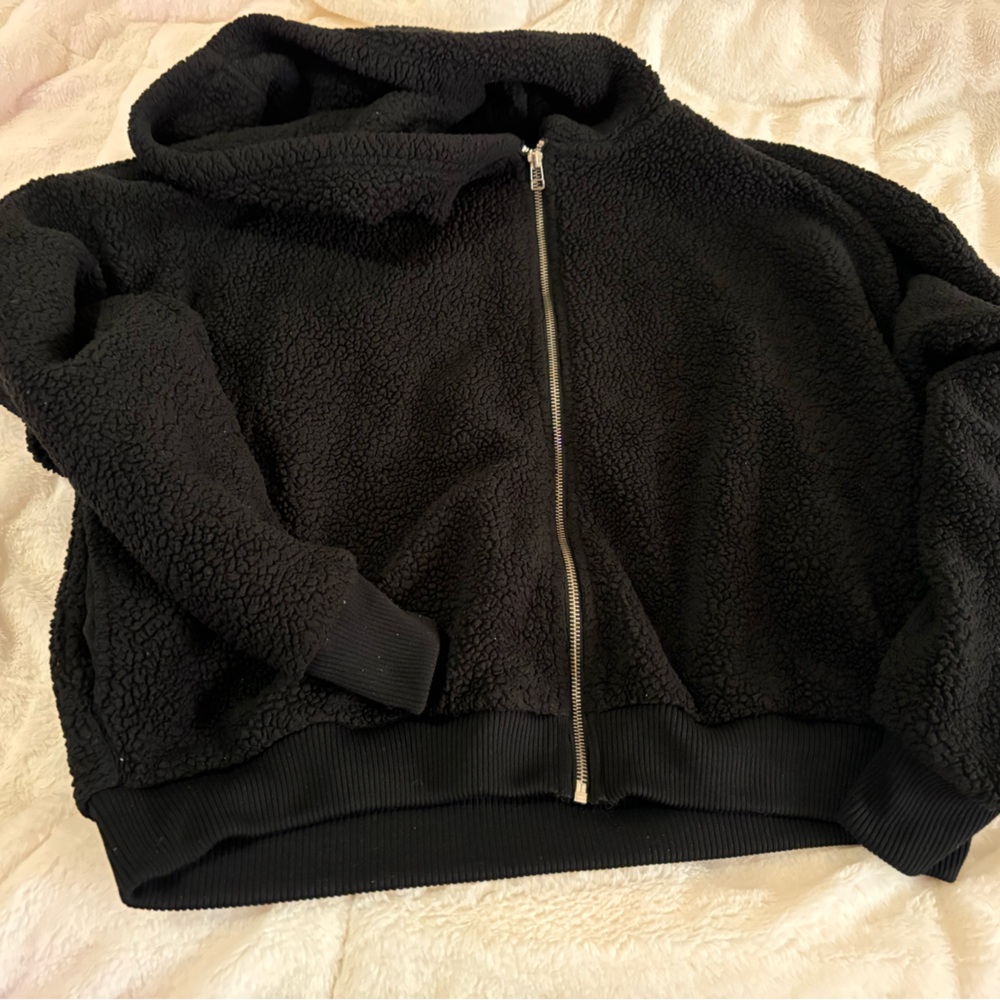 black puffer sweater